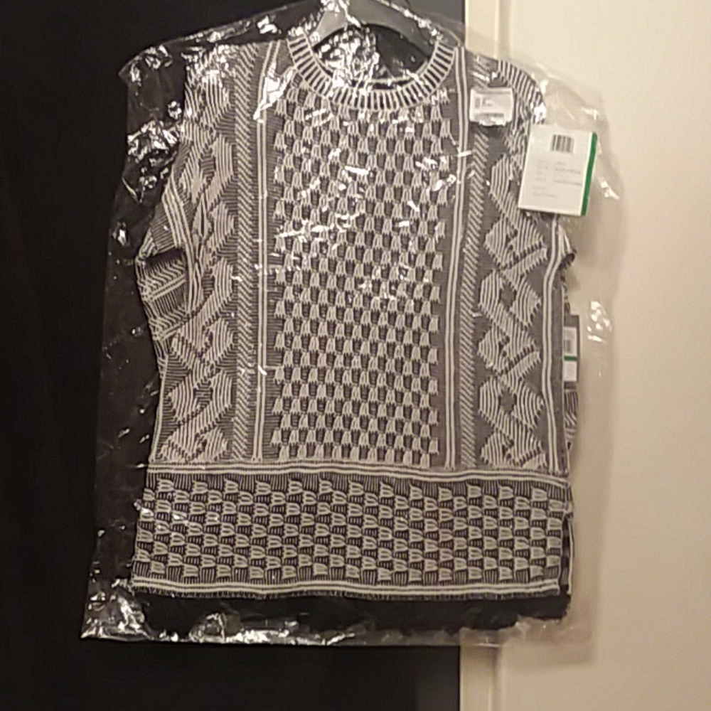 Jacquard sweater with fringe